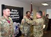 Col. Marc Welde, right, commander of U.S. Army Medical Logistics Command, places the Order of Military Medical Merit medallion over the head of Lt. Col. Ibrahim Kabbah, symbolizing his induction into the prestigious organization, during an AMLC awards ceremony Feb. 29 at Fort Detrick, Maryland.