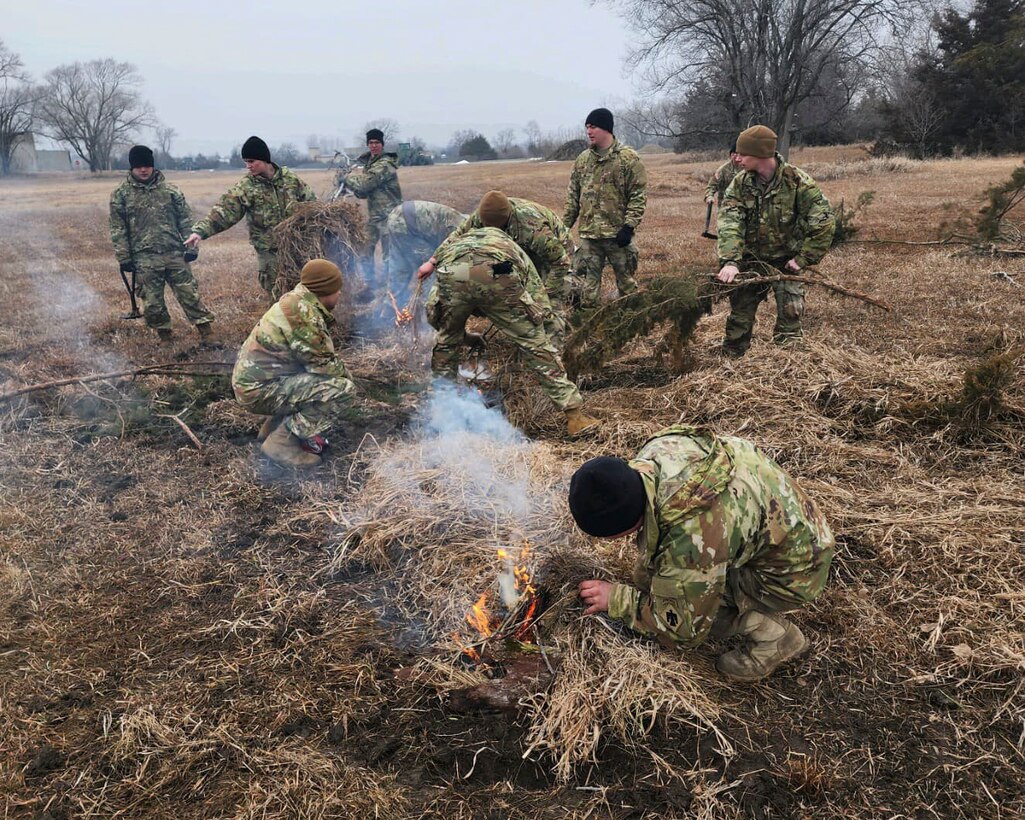 Soldiers with the Nebraska Army National Guard’s Company B, 2-134th Infantry (Airborne), conduct survival, evasion, resistance and escape training Feb. 3-4, 2024, at the Mead Training Site near Yutan, Nebraska. The 59 Soldiers were trained by six U.S. Air Force instructors from the 55th Operations Support Squadron from Offutt Air Force Base.