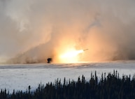 Marines from Fox Battery, 2nd Battalion, 14th Marine Regiment, fire rockets from the High Mobility Artillery Rocket System (HIMARS) in the Yukon Training Area of Fort Wainwright. The Marines were in Alaska to participate in the Arctic Edge exercise and provide HIMARS support for a variety of training objectives. (photo by Eve Baker, Fort Wainwright Public Affairs Office)