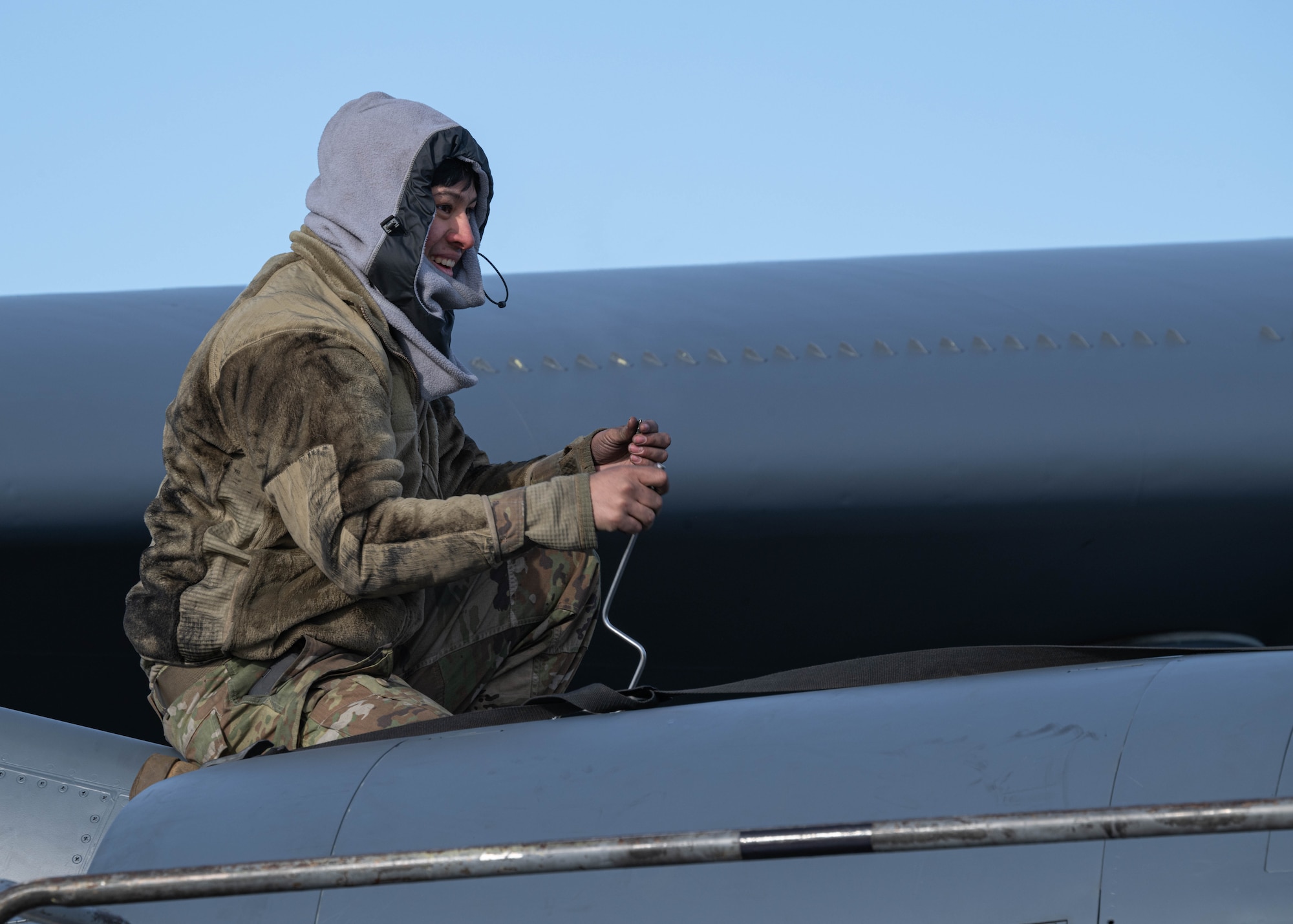Airman 1st Class Anthony Melendrez, 5th Aircraft Maintenance Squadron electrical and environmental systems specialist, performs maintenance on a B-52H Stratofortress at Minot Air Force Base, North Dakota, Feb. 28, 2024. Electrical and environmental systems specialists are responsible for maintaining and repairing the wiring and electrical components on an aircraft. (U.S. Air Force photo by Airman 1st Class Kyle Wilson)