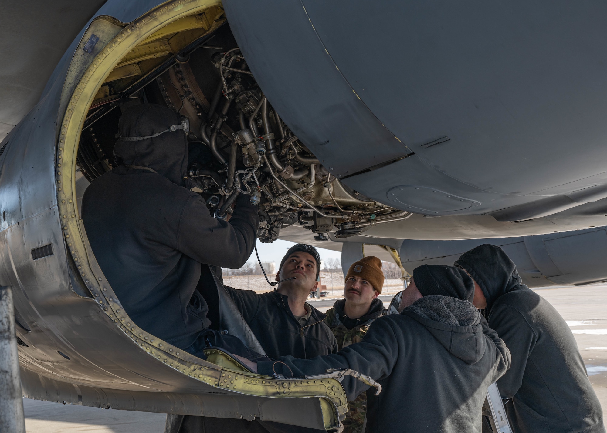 Airmen assigned to the 5th Aircraft Maintenance Squadron perform maintenance on a B-52H Stratofortress engine at Minot Air Force Base, North Dakota, Feb. 28, 2024. The 5th Aircraft Maintenance Squadron’s primary duties consist of troubleshooting and maintaining the systems of the B-52H Stratofortress. (U.S. Air Force photo by Airman 1st Class Kyle Wilson)