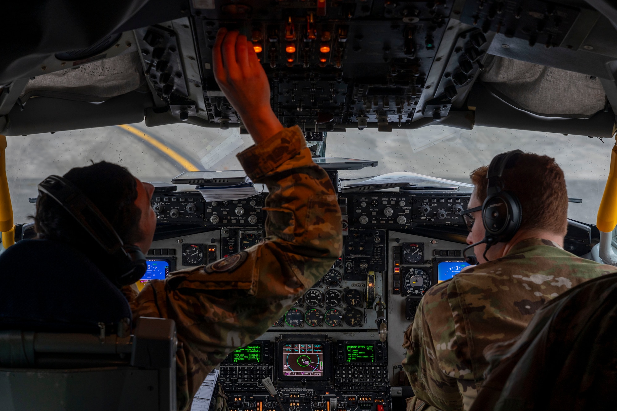 Capt. Tyler Smisek, left, and Capt. Drake Emlong, both 350th Air Refueling Squadron pilots, conduct pre-flight checks during EXPLODEO Feb. 27, 2024, at Joint Base Lewis-McChord, Washington. EXPLODEO was a McConnell Air Force Base, Kansas, exercise that tested the 22nd and 931st Air Refueling Wings’ ability to rapidly deploy and employ into a theater. (U.S. Air Force photo by Airman 1st Class Gavin Hameed)