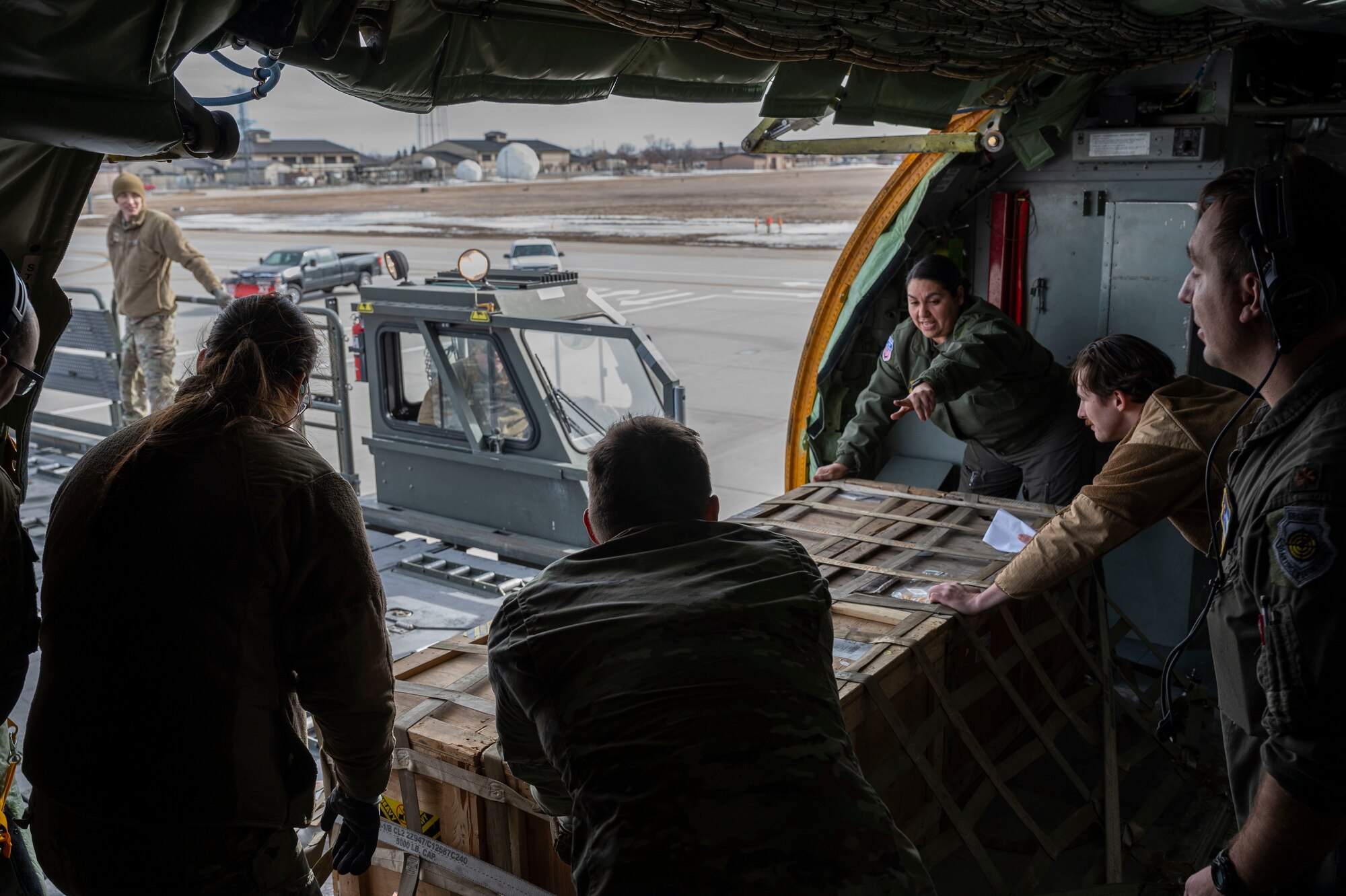 Air crew assigned the 344th Air Refueling Squadron load cargo onto a KC-135 Stratotanker during EXPLODEO Feb. 26, 2024, at Grand Forks Air Force Base, North Dakota. EXPLODEO was a McConnell Air Force Base, Kansas, exercise that tested the 22nd and 931st Air Refueling Wings’ ability to rapidly deploy and employ into a theater. (U.S. Air Force photo by Airman 1st Class Gavin Hameed)