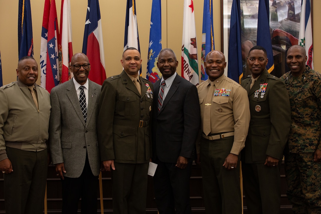 U.S. Marine Corps Brig. Gen. David R. Everly, director of Manpower Policy and Plans, Manpower and Reserve Affairs, is flanked by current and retired U.S. Marine Corps generals following his promotion ceremony in Quantico, VA, March 1, 2024. Marine generals must be nominated by the president of the United States and confirmed for duty by the Senate prior to promotion. (U.S. Marine Corps photo by LCpl Anthony Ramsey)