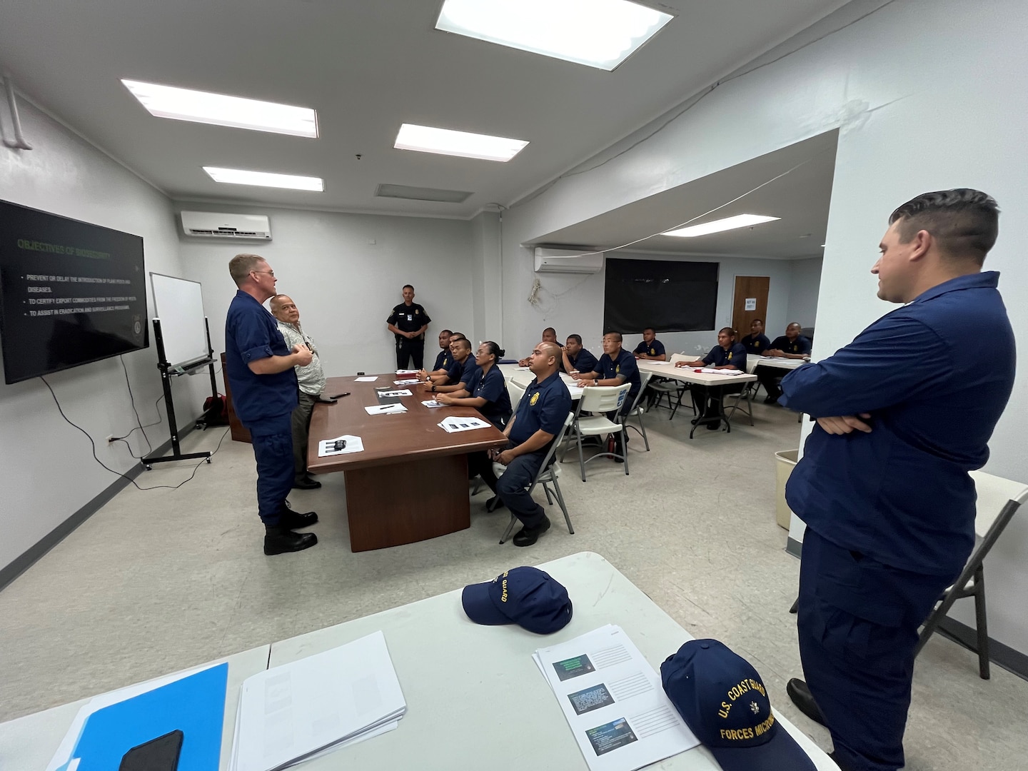 Capt. Nick Simmons, commander of U.S. Coast Guard Forces Micronesia and the Captain of the Port for Guam and the Marianas, visits with members of the Commonwealth of the Northern Mariana Islands Customs and Biosecurity in Saipan on Feb. 29, 2024. The visit highlights the Coast Guard's ongoing commitment to maritime safety, security, and environmental stewardship in the CNMI. (U.S. Coast Guard photo by Lt. Justin Miller)