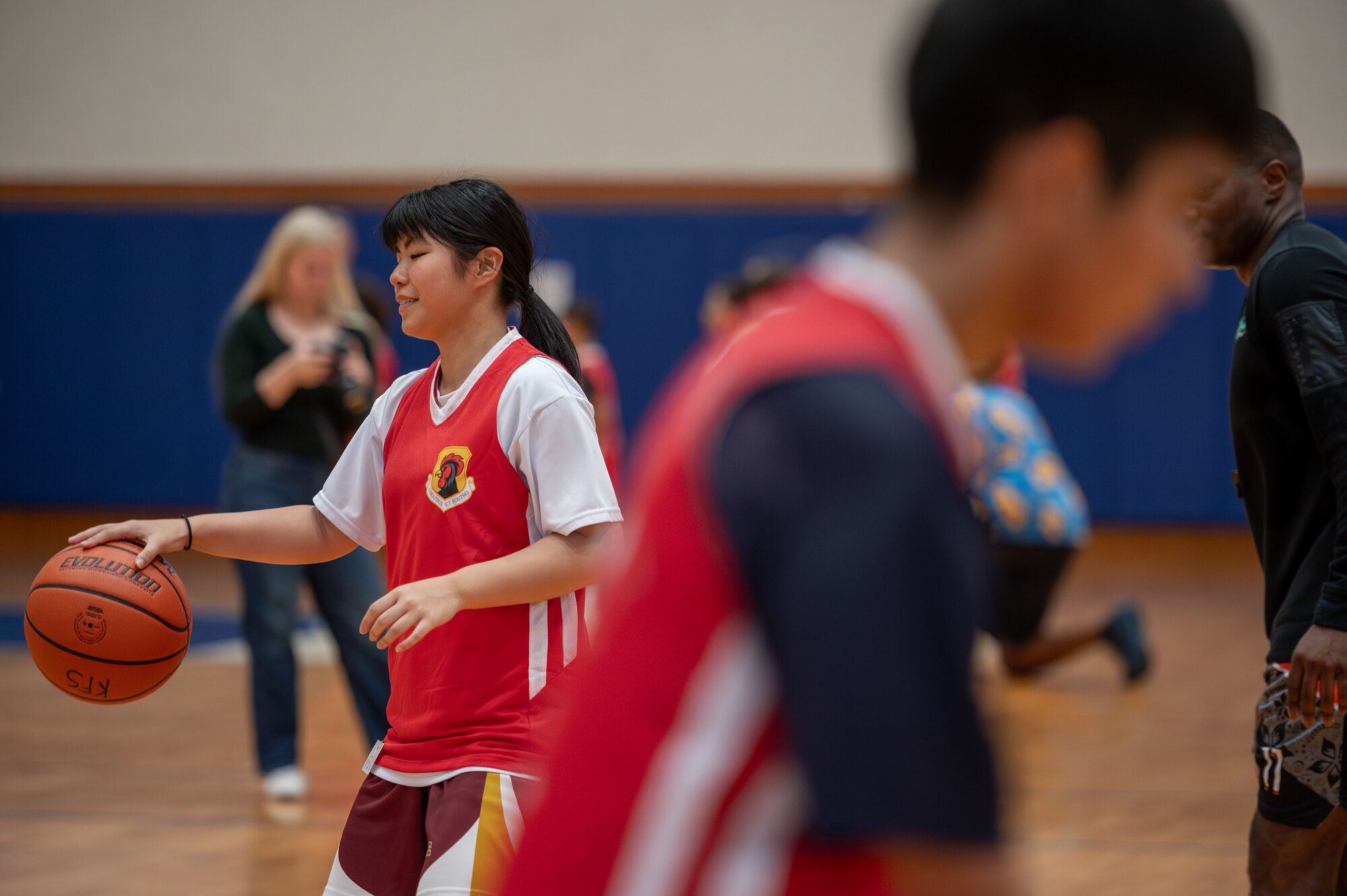 Child practices basketball drills