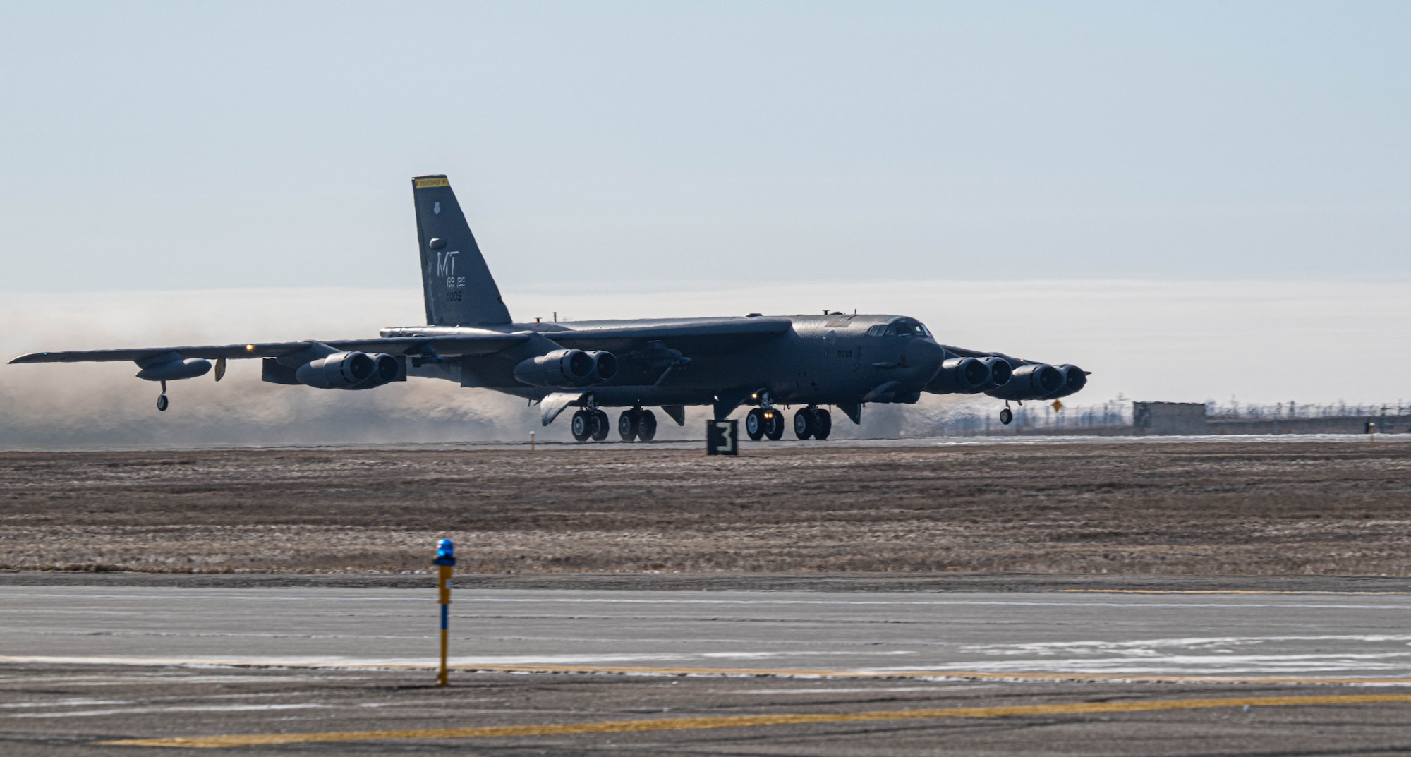 A U.S. Air Force B-52H Stratofortress assigned to the 69th Bomb Squadron, takes off from the runway at Minot Air Force Base, North Dakota, Feb. 28, 2024. Each of the B-52’s eight engines is capable of producing up to 17,000 pounds of thrust; allowing it to fly at high subsonic speeds at altitudes of up to 50,000 feet, while carrying a payload of up to 70,000 pounds. (U.S. Air Force photo by Airman 1st Class Kyle Wilson)