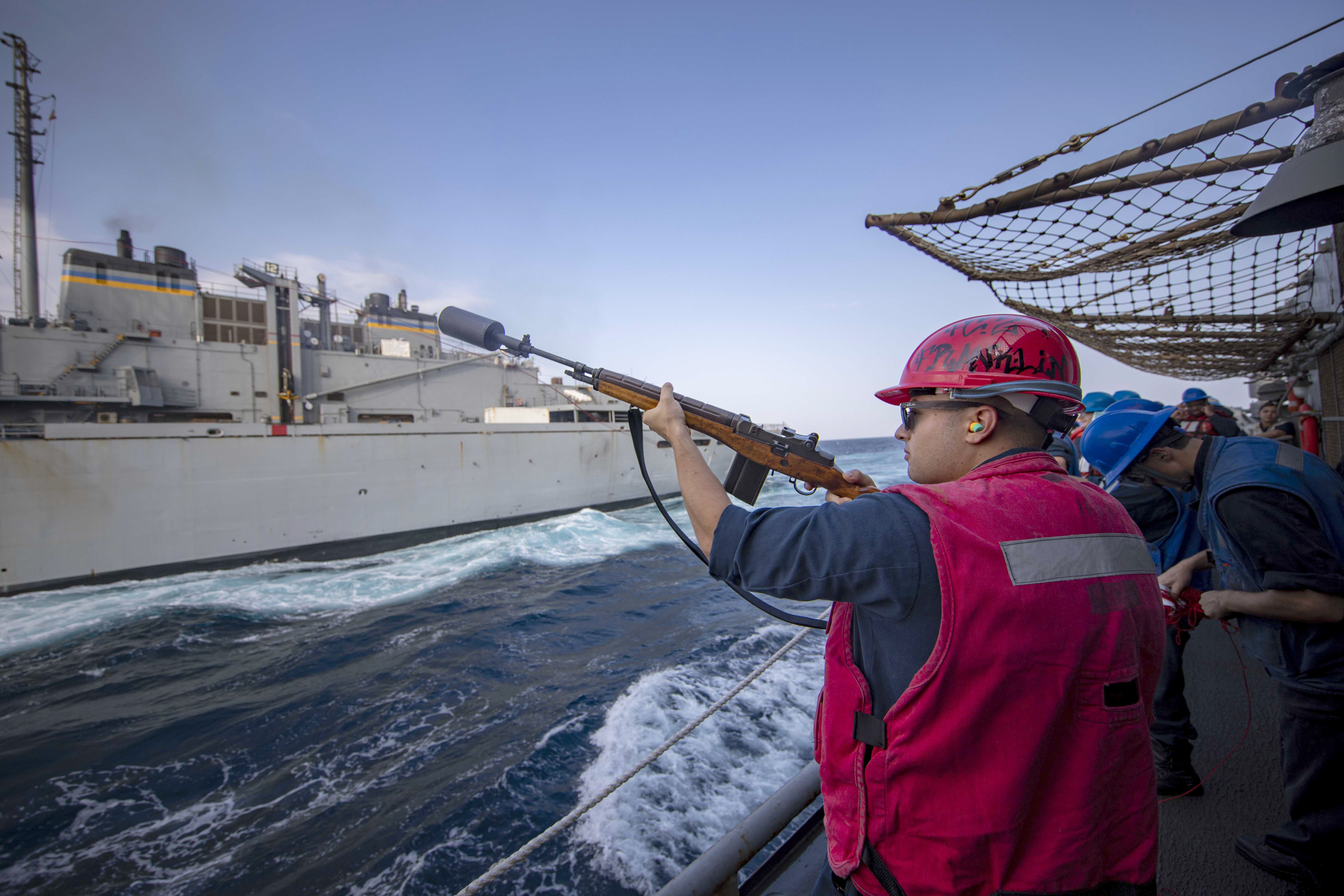 USS Philippine Sea (CG 58) during a replenishment-at-sea in the Red Sea.