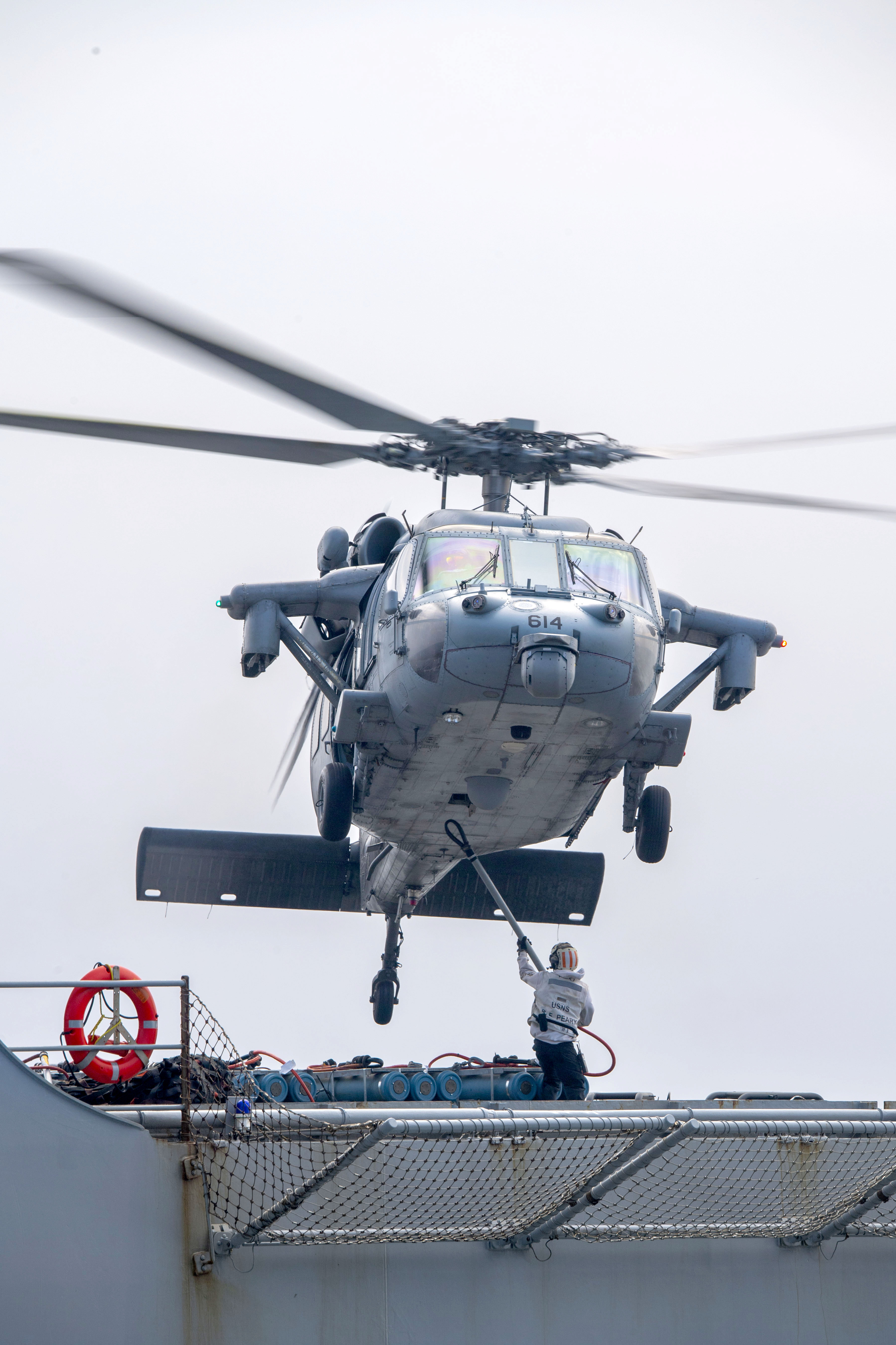 HSC-11 moves cargo from USNS Robert E. Peary (T-AKE 5) during a vertical replenishment with USS Harry S. Truman (CVN 75).