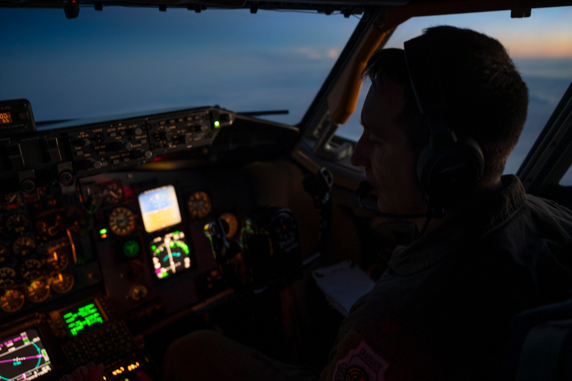Maj. Kyle Baker, 22nd Operations Support Squadron chief of tactics, pilots a KC-135 Stratotanker during EXPLODEO Feb. 28, 2024, over Kansas. EXPLODEO was a McConnell Air Force Base, Kansas, exercise that tested the 22nd and 931st Air Refueling Wings’ ability to rapidly deploy and employ into a theater. (U.S. Air Force photo by Airman 1st Class Gavin Hameed)