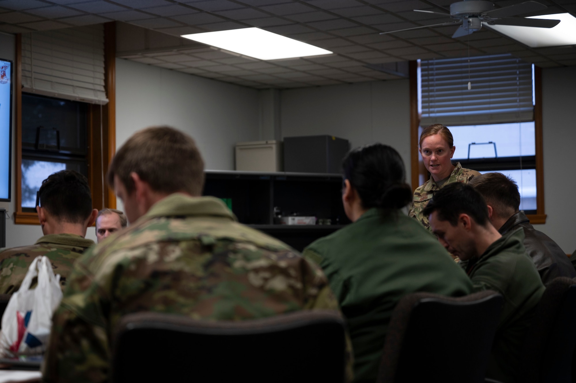 Lt. Col. Kristen Smith, McConnell EXPLODEO lead planner, conducts a mission brief during EXPLODEO Feb. 27, 2024, at Joint Base Lewis-McChord, Washington. EXPLODEO was a McConnell Air Force Base, Kansas, exercise that tested the 22nd and 931st Air Refueling Wings’ ability to rapidly deploy and employ into a theater. (U.S. Air Force photo by Airman 1st Class Gavin Hameed)