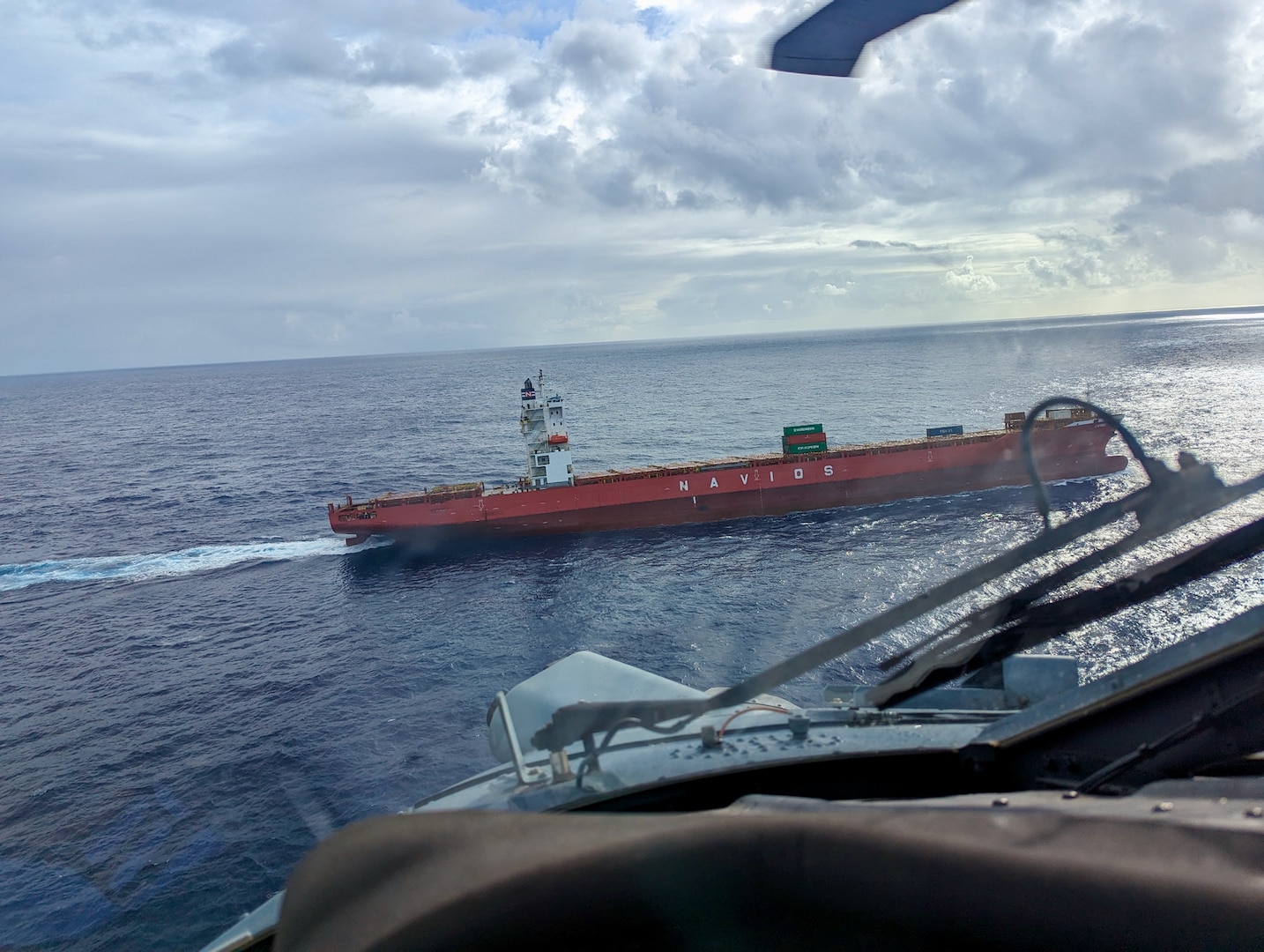 In a display of interagency cooperation, a commercial mariner in urgent need of medical care was safely evacuated from a vessel 100 nautical miles offshore to Guam on March 2, 2024, thanks to the actions of the U.S. Coast Guard and the U.S. Navy's Helicopter Sea Combat Squadron 25 (HSC-25). Responders initiated the operation after a 26-year-old Filipino mariner aboard the 850-foot Liberian-flagged container ship Carmell 1, initially located 400 nautical miles northwest of Guam, reportedly exhibited severe abdominal issues. (U.S. Navy photo)