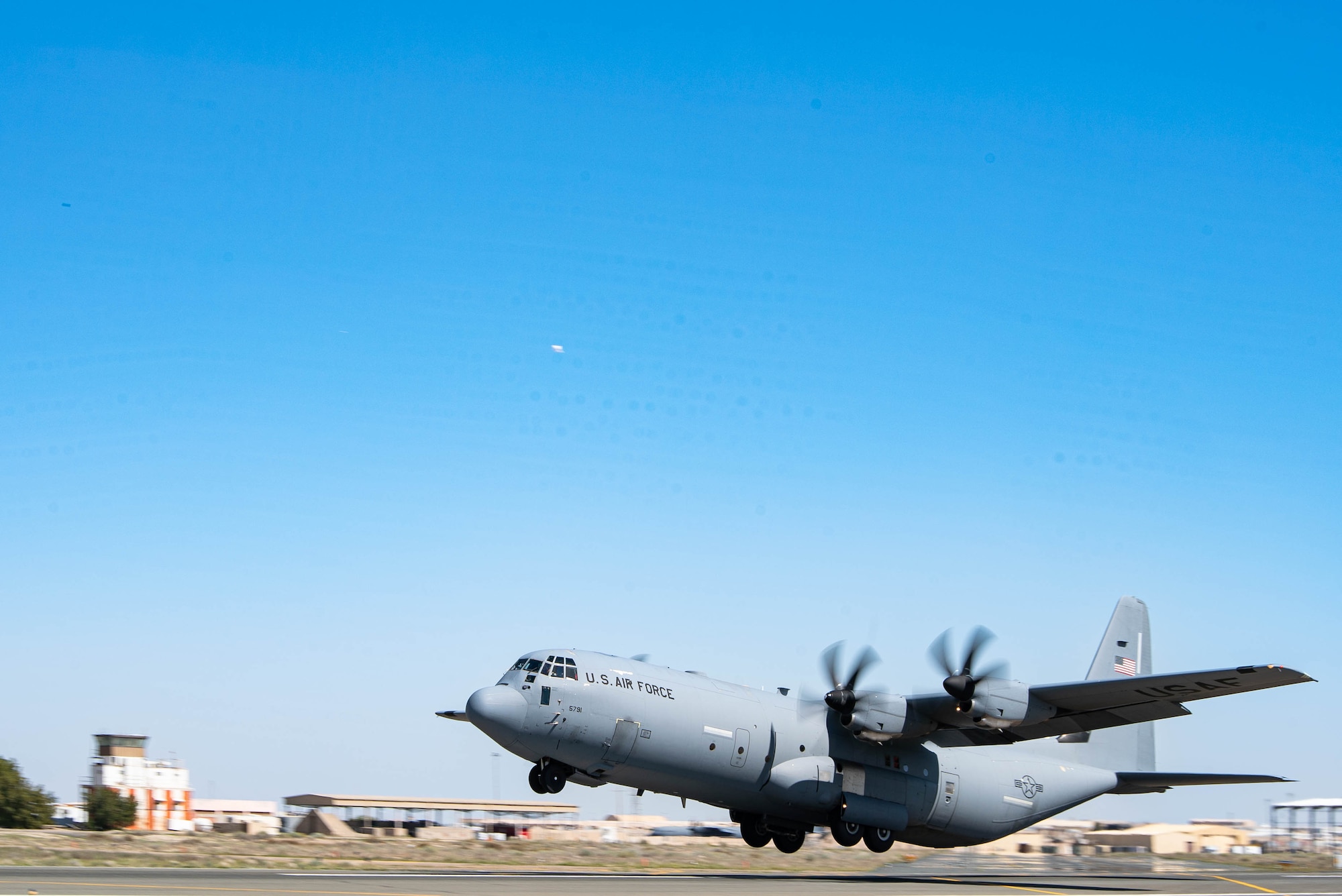 A C-130J Super Hercules loaded with humanitarian aid bound for airdrop over Gaza takes off from an undisclosed location in Southwest Asia, March 2.