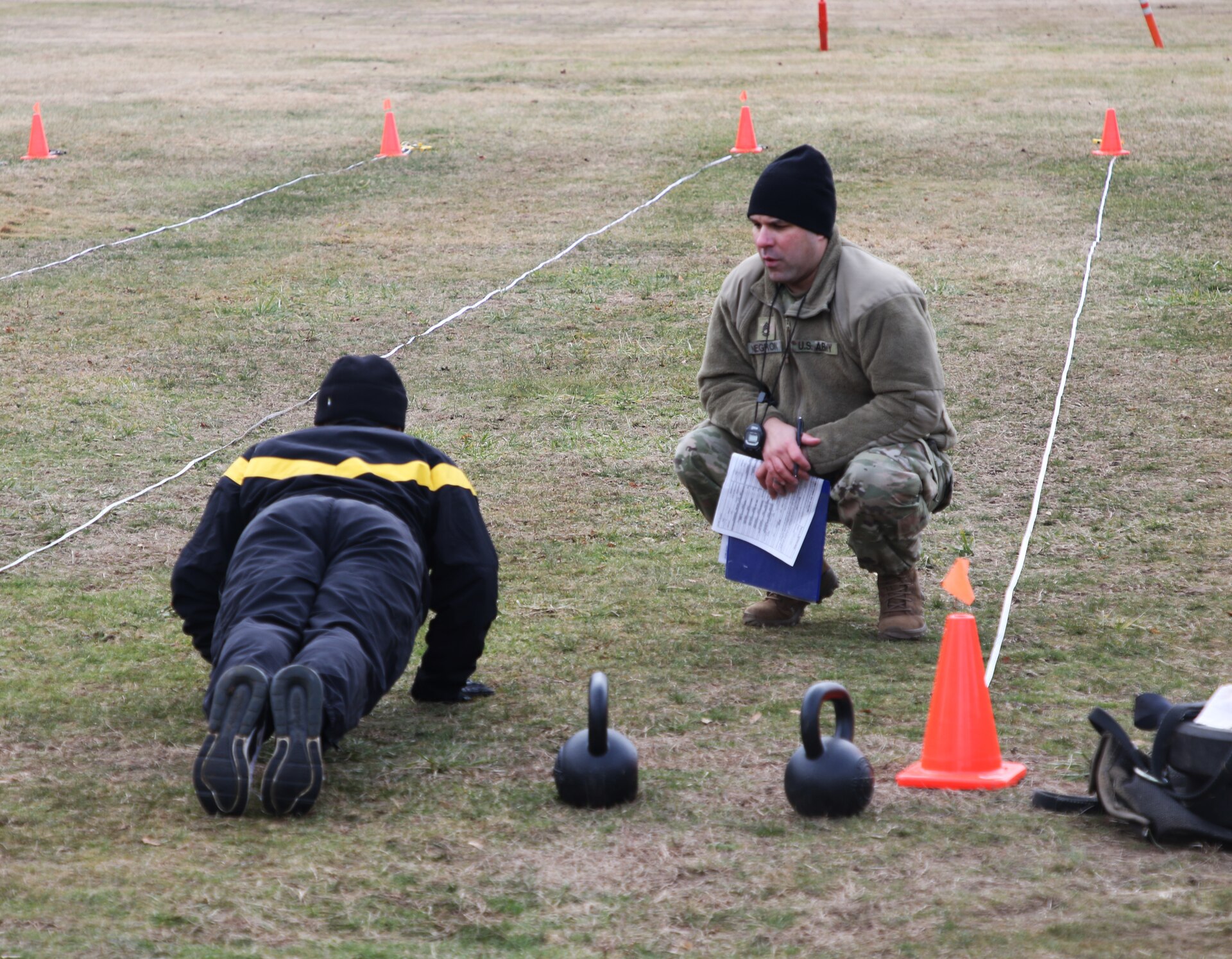 Soldiers perform hand release push-ups as apart of the Army Combat Fitness Test. Instructors from the 83rd United States Army Reserve Readiness Training Center (ARRTC) under the 100th Training Division, had 32 soldiers graduate from the Basic Leaders Course (BLC).
