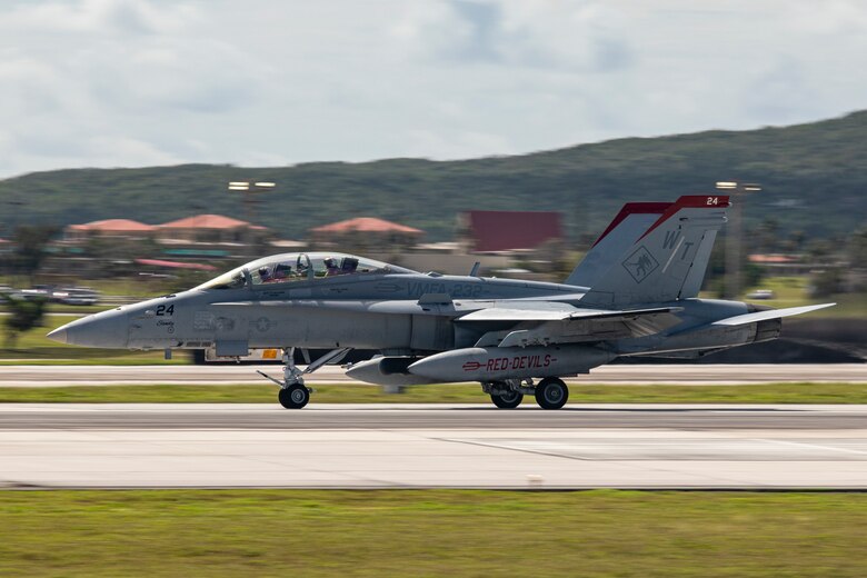 A U.S. Marine Corps F/A-18D Hornet aircraft with Marine Fighter Attack Squadron (VMFA) 232 taxis the runway at Andersen Air Force Base, Guam, Jan. 24, 2024. Nicknamed the “Red Devils,” VMFA-232 traveled from Marine Corps Air Station Iwakuni, Japan to Guam as a part of their Aviation Training Relocation Program deployment to train multilaterally with allies and partners, and enhance the squadron’s combat readiness. (U.S. Marine Corps photo by Lance Cpl. David Getz)