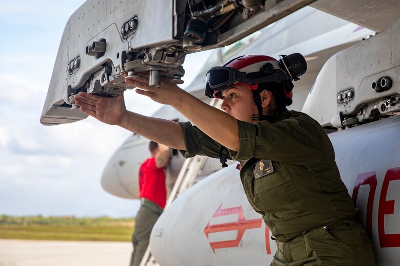 U.S. Marine Corps Cpl. Alicia Prieto, an aviation ordnance technician with Marine Fighter Attack Squadron (VMFA) 232, prepares to load GBU-32 joint direct attack munition into an F/A-18D Hornet aircraft at Andersen Air Force Base, Guam, Jan. 26, 2024. Nicknamed the “Red Devils,” VMFA-232 traveled from Marine Corps Air Station Iwakuni, Japan to Guam as a part of their Aviation Training Relocation Program deployment to train multilaterally with allies and partners, and enhance the squadron’s combat readiness. (U.S. Marine Corps photo by Lance Cpl. David Getz)