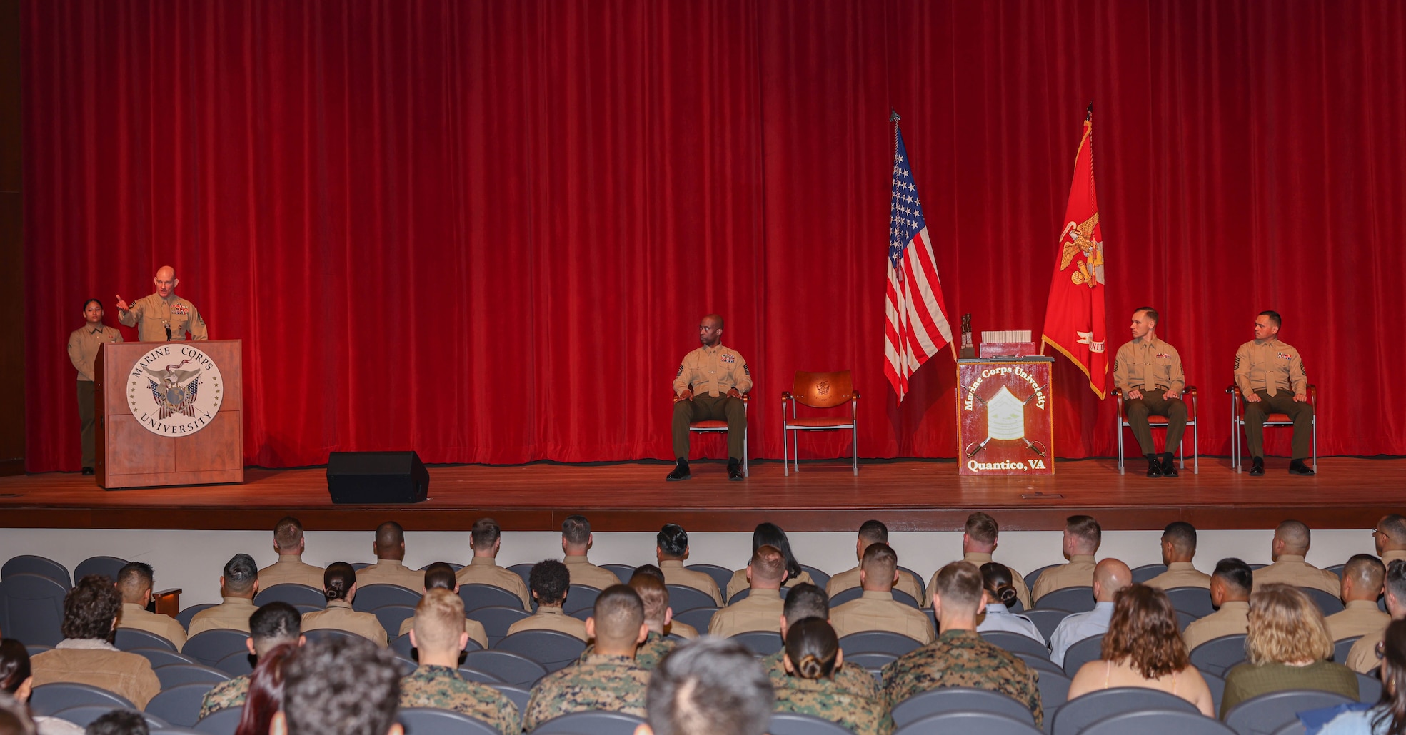 U.S. Marine Corps Sgt. Maj. Troy E. Black, senior enlisted advisor to the Chairman of the Joint Chiefs of Staff, addresses attendees of the Marine Corps University Career and Advanced School graduation on Marine Corps Base Quantico, Virginia, Feb. 28, 2024. Graduates of the Marine Corps University Resident Career School and Resident Advanced School were the first Marines addressed directly by Sgt. Maj. Black since assuming the position of SEAC. (U.S. Marine Corps photo by Lance Cpl. David Brandes)