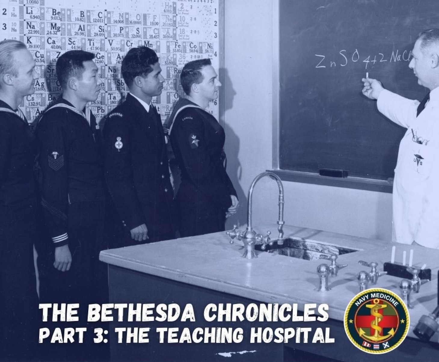 An instructor at the Clinical Laboratory Technique School, Naval Medical School, Bethesda, discusses a chemical equation with foreign naval students, ca. 1960. BUMED Archives