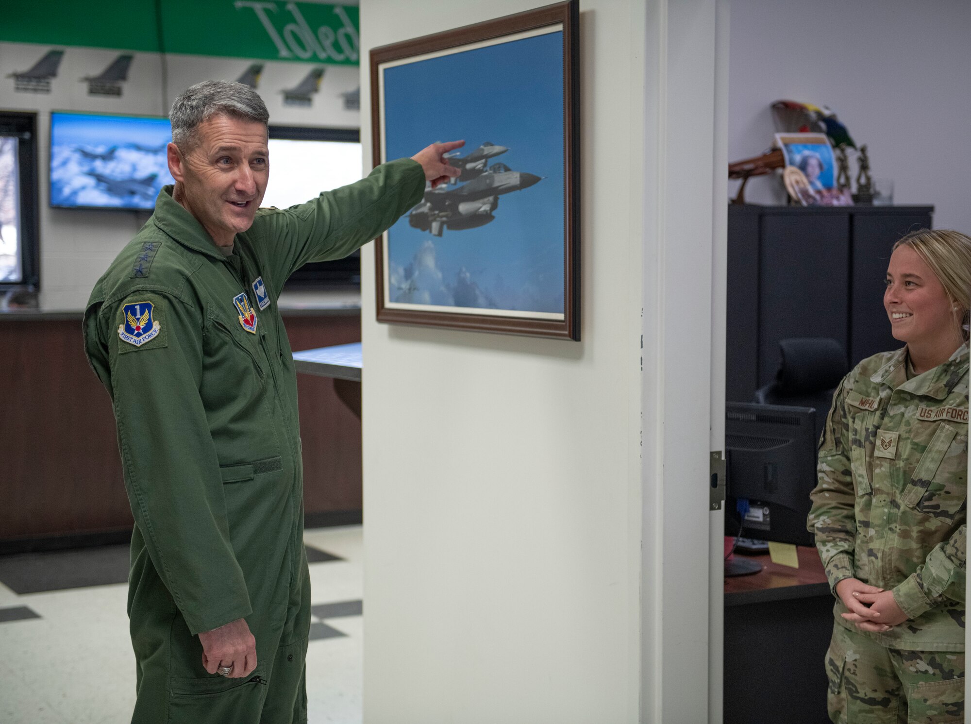 U.S. Air Force Lt. Gen. Steven S. Nordhaus, 1st Air Force commander, converses with U.S. Air Force Staff Sgt. Jordan Mohler, an aviation resource manager assigned to the Ohio National Guard’s 180th Fighter Wing, in Swanton, Ohio, Feb. 1, 2024. Nordhaus, who commanded the 180FW from 2011 to 2013, received a tour of the wing's facilities and discussed the 180FW’s Aerospace Control Alert mission during his visit. (U.S. Air National Guard photo by Airman 1st Class Nicholas Battani)