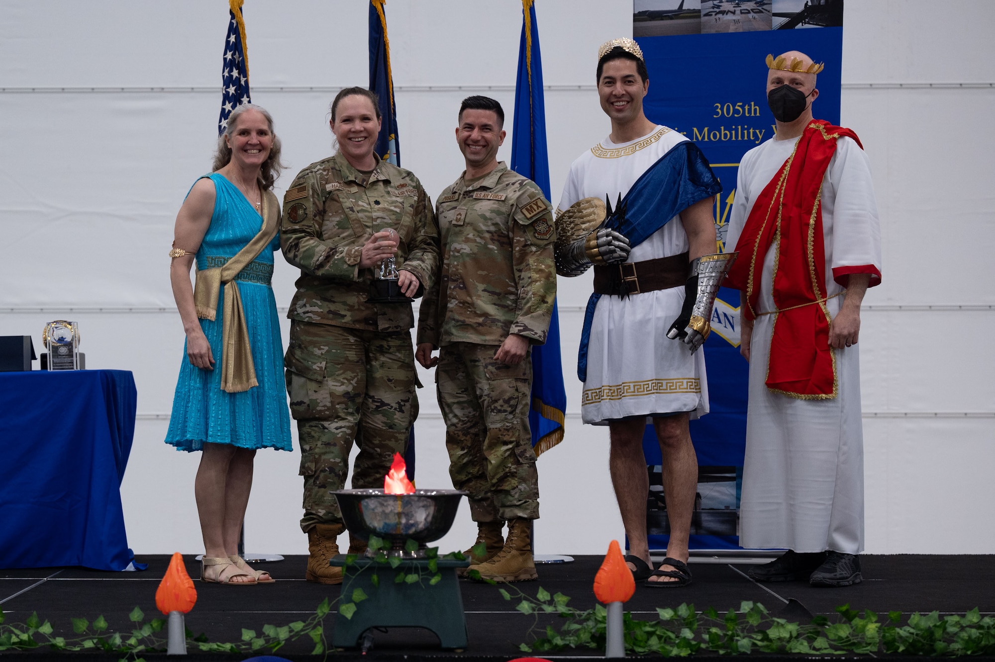 305th Air Mobility Wing leadership poses for a photo with award winners during the wing’s Annual Awards Ceremony at Joint Base McGuire-Dix-Lakehurst, N.J., Feb. 23, 2024. Award recipients were recognized for their exceptional performances throughout 2023. (U.S. Air Force photo by Staff Sgt. Monica Roybal)