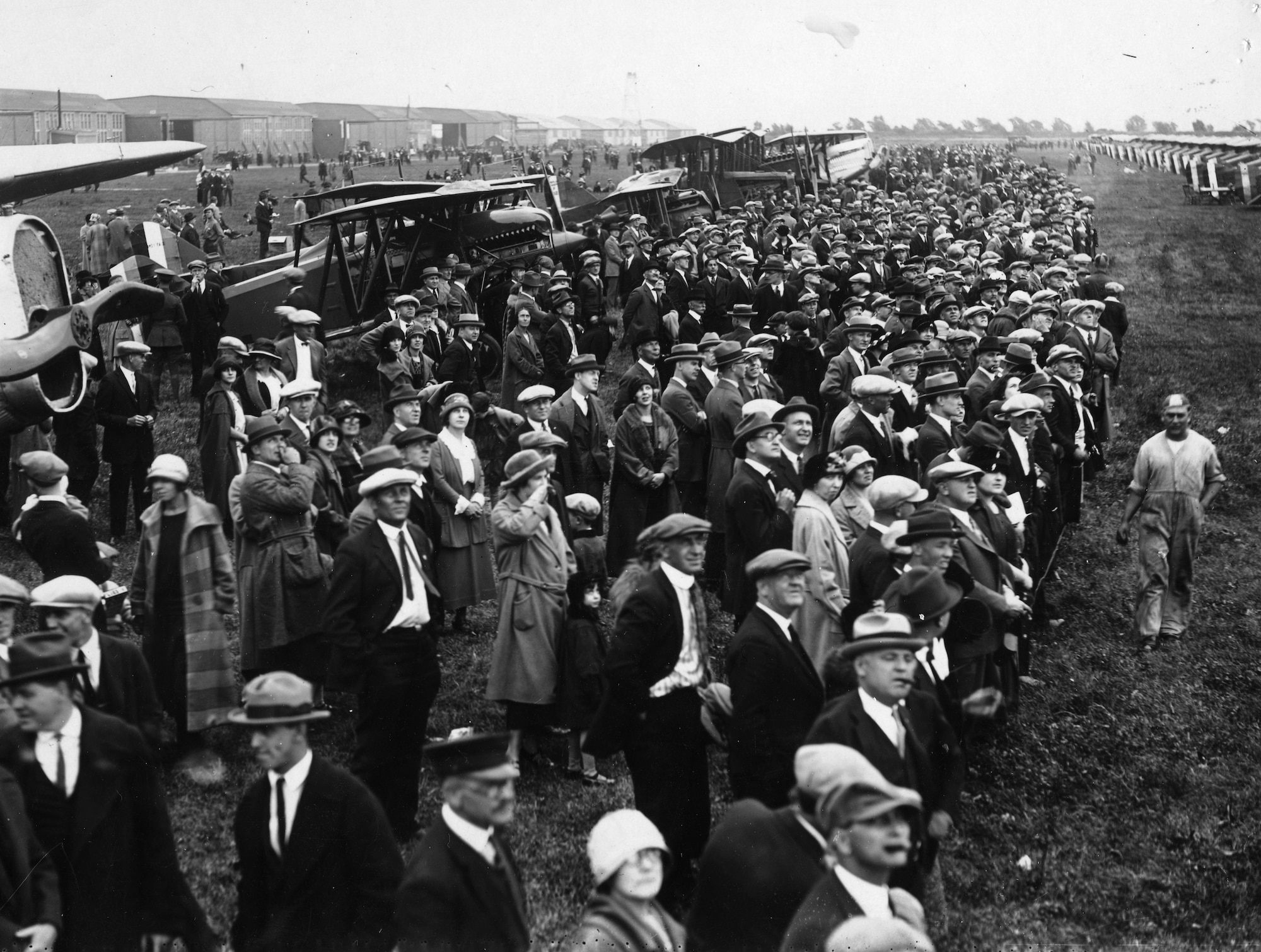 Approximately 15,000 spectators observe aerial demonstrations during an air show at Selfridge Field, Michigan