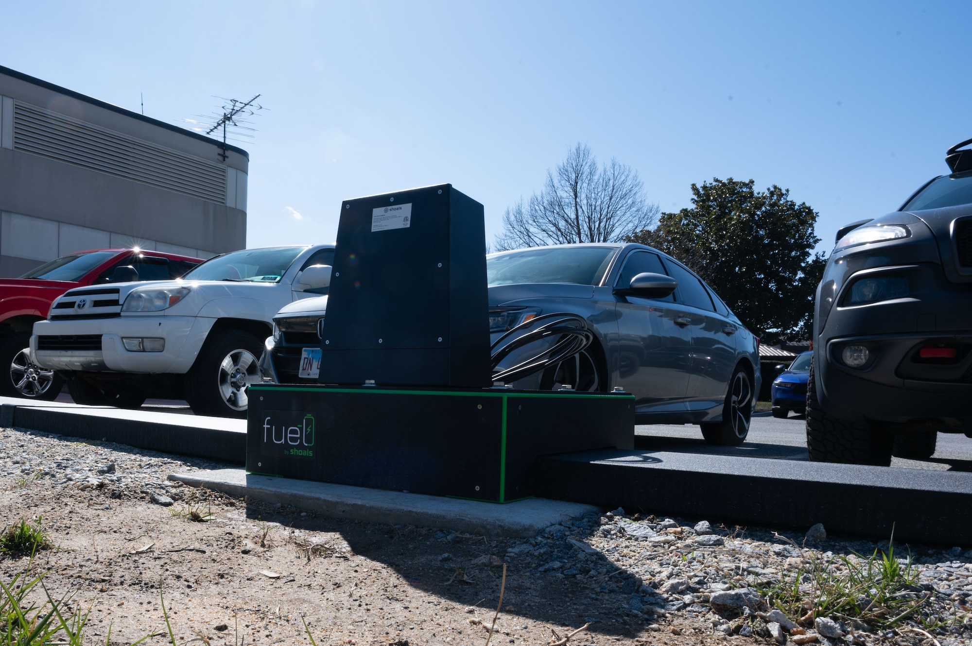 An electric vehicle charger is stationed outside the 436th Civil Engineer Squadron at Dover Air Force Base, Delaware, Feb. 29, 2024. Team Dover’s switch to EV’s began in November 2022 and is currently in phase three of the five-phase process; it is anticipated to be completed by the end of 2024. (U.S. Air Force photo by Airman 1st Class Dieondiere Jefferies)