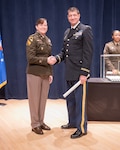 1st Lt. Nick Harrison, stands for a photograph with Maj. Gen. Alison C. Martin, Commanding General/Commandant, U.S. Army Judge Advocate General’s Legal Center and School, following his completion of the 222nd Officer Basic Course, Charlottesville, Va., Feb. 28, 2024.  Initially enlisting in 2000, 1st Lt. Harrison calls the military the cornerstone of his personal and professional development.  (U.S. Army photo courtesy of U.S. Army Judge Advocate General’s Legal Center and School)