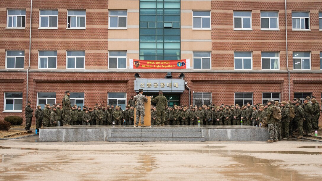 U.S. Marine Corps Maj. Todd Sturgill, the company commander for Headquarters Company, Headquarters Battalion, 1st Marine Division, speaks to Marines about building a combined command post in preparation for Freedom Shield 24 in Pohang, South Korea, Feb. 25, 2024. FS 24 is a defense-oriented exercise designed to strengthen the ROK-U.S. Alliance, enhance the combined defense posture, and further strengthen security and stability on the Korean peninsula. Sturgill is a native of Virginia. (U.S. Marine Corps photo by Staff Sgt. Amanda R. Taylor)