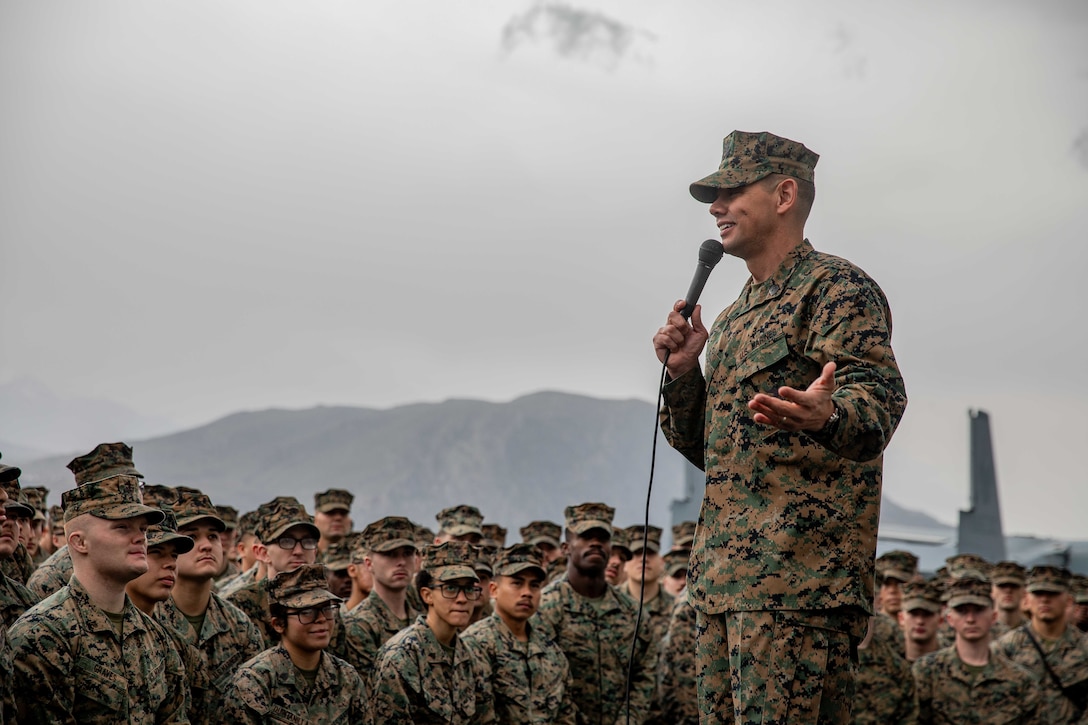 U.S. Marine Corps Sgt. Maj. Carlos A. Ruiz, Sergeant Major of the Marine Corps, addresses Marines and Sailors of the 26th Marine Expeditionary Unit (Special Operations Capable) (MEU(SOC)), during an all-hands formation aboard the Wasp-class amphibious assault ship USS Bataan (LHD 5), Souda Bay, Greece, March 1, 2024. The 20th Sergeant Major of the Marine Corps visited the forward deployed 26th MEU(SOC) and met with leadership while also hosting discussions with Marines and Sailors. The Bataan Amphibious Ready Group, with the embarked 26th MEU(SOC) is on a scheduled deployment in the U.S. Naval Forces Europe area of operations, employed by U.S. 6th Fleet to defend U.S., Allied and partner interests. (U.S. Marine Corps photo by Sgt. Nayelly Nieves-Nieves)