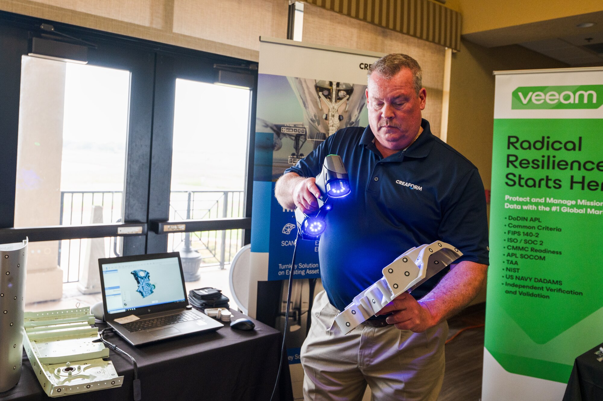 Keesler Tech Expo vendor displays three dimensional scanning of a machine component on Keesler Air Force Base, Mississippi, Feb. 28, 2024.