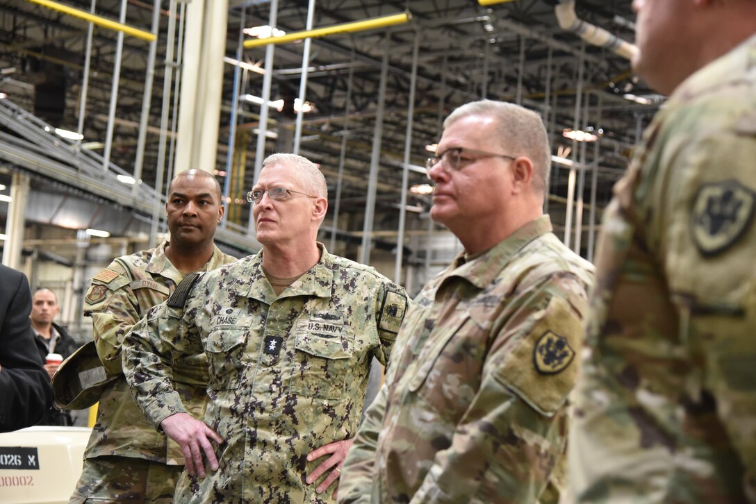 Military men in a warehouse