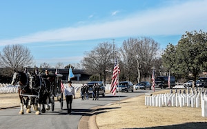U.S. Soldiers assigned to the 1st Infantry Division lead the procession for a memorial service that honored Capt. Larry L. Taylor for his actions in the Vietnam War, at the Chattanooga National Cemetery in Chattanooga, Tennessee, on Feb. 7, 2024. Due to his exemplary service and courage in a near-death rescue mission, Taylor received the Medal of Honor on Sept. 5, 2023. (U.S. Army photo by Spc. Dawson Smith)