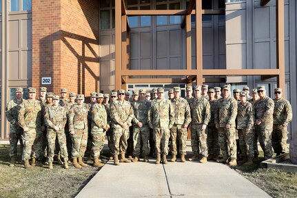 Battalion command teams, from across the 85th U.S. Army Reserve Support Command, pause for a photo during the 85th USARSC three-day BN CMD Teams Training event in Arlington Heights, Illinois, March 3, 2024, to learn about the budgeting process, mobilization and other key issues across the command.