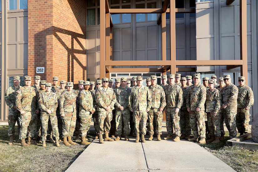 Battalion command teams, from across the 85th U.S. Army Reserve Support Command, pause for a photo during the 85th USARSC three-day BN CMD Teams Training event in Arlington Heights, Illinois, March 3, 2024, to learn about the budgeting process, mobilization and other key issues across the command.