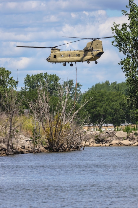 Michigan Army National Guard Soldiers with the 3rd Battalion, 238th General Support Aviation Regiment based in Grand Ledge and Selfridge Air National Guard Base (SANGB), conduct firefighting training at SANGB on July 29, 2022.