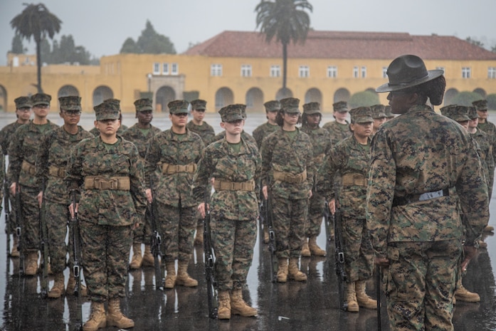 U.S. Marine Corps Staff Sgt. Jazjuan WallaceSipp, a drill instructor with Mike Company, 3rd Recruit Training Battalion, forms her platoon for the final drill evaluation at Marine Corps Recruit Depot San Diego, California, Mar. 2, 2024. During the final drill evaluation, the platoons are scored based on their uniforms, bearing, and movements, as well as the senior drill instructor’s cadence, sword control, and movement commands. (U.S. Marine Corps photo by Sgt. Jesse K. Carter-Powell)