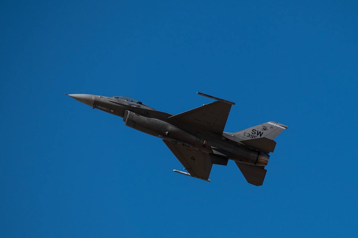 An F-16 Fighting Falcon aircraft flies during the Heritage Flight Training Course at Davis-Monthan Air Force Base, Ariz., March 1, 2024. The F-16 Viper Demonstration Team performed in over 20 airshows annually around the country, as well as internationally to recruit, retain and inspire the next generation of U.S. Air Force Airmen. (U.S. Air Force photo by Airman 1st Class Jasmyne Bridgers-Matos)