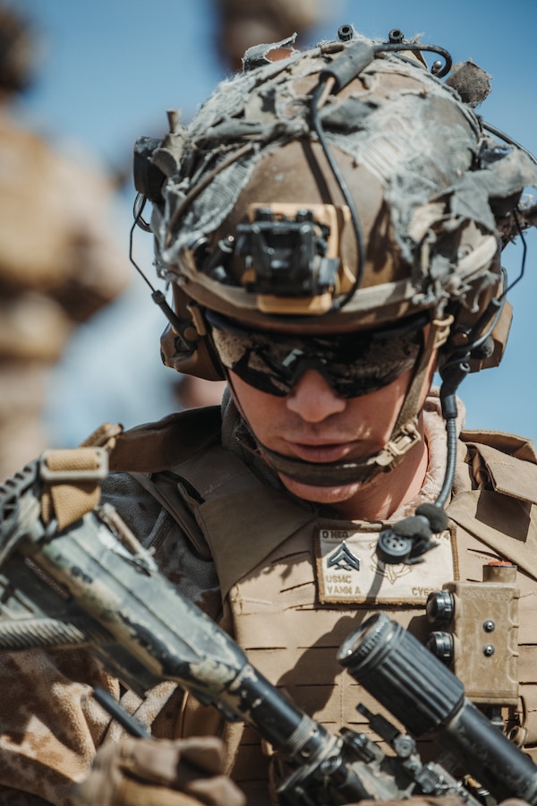 U.S. Marine Corps Cpl. Aron Vann, an Austin, Texas native, infantry Marine with Charlie Company, 1st Battalion, 4th Marine Regiment, 1st Marine Division, records injury data during a Marine Air-Ground Task Force Distributed Maneuver Exercise as part of Service Level Training Exercise 2-24 at Marine Corps Air-Ground Combat Center, Twentynine Palms, California, Feb. 15, 2024. MDMX is designed to test the MAGTF’s operational capabilities in austere, multi-domain, offensive and defensive operations against adversaries at a regimental level. (U.S. Marine Corps photo by Lance Cpl. Justin J. Marty)