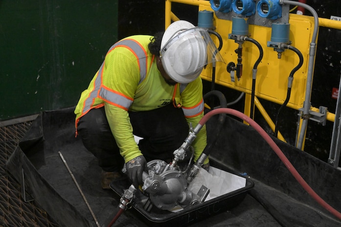 A member in support of Joint Task Force – Red Hill (JTF-RH) prepares a drainage line at the Underground Pump House located on Joint Base Pearl Harbor-Hickam (JBPHH), Hawaii, March. 1, 2024.