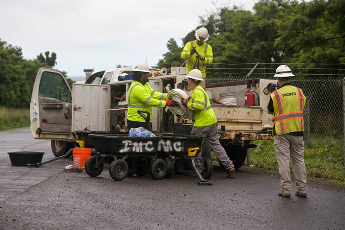 Personnel in support of Joint Task Force-Red Hill (JTF-RH) load gear onto a truck outside of the Red Hill Bulk Fuel Storage Facility (RHBFSF) located in Halawa, Hawaii, as they prepare to relocate to Joint Base Pearl Harbor-Hickam to continue defueling Feb. 26, 2024.