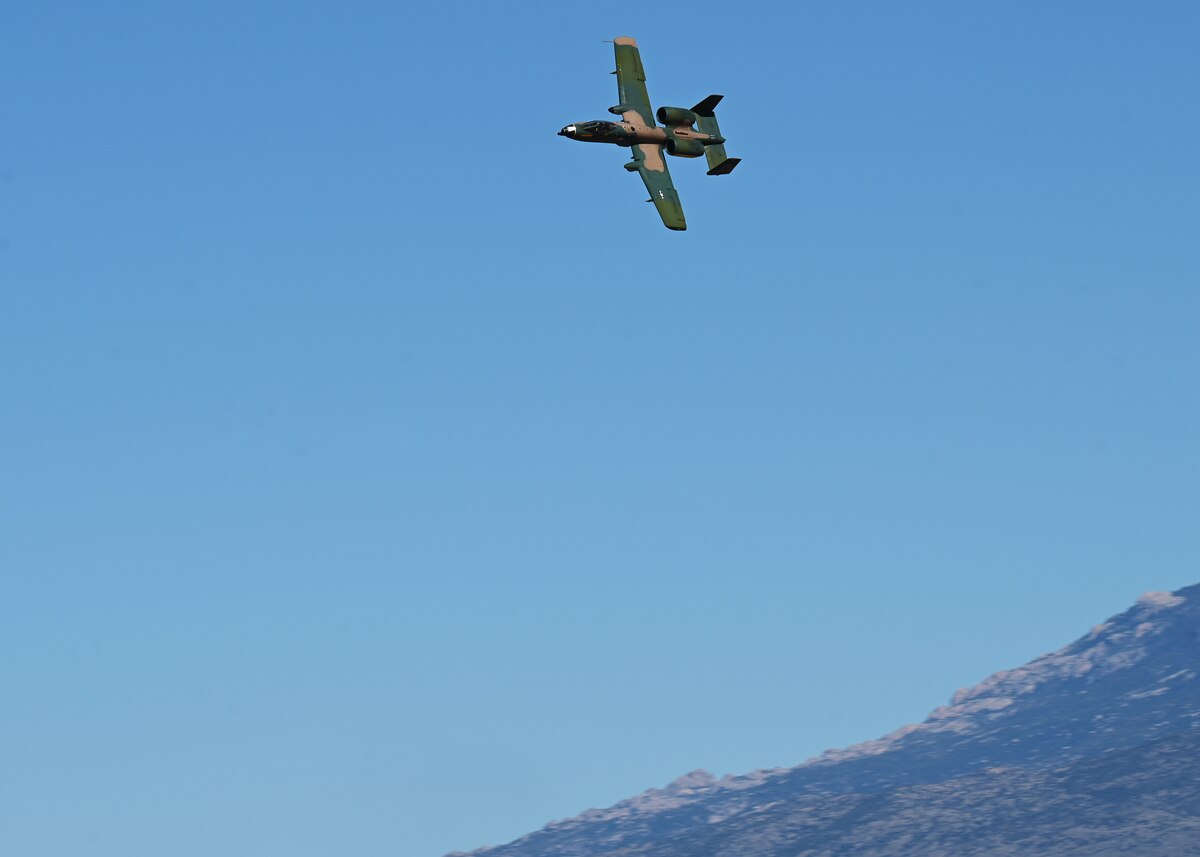 An A-10 Thunderbolt II aircraft soars during the Heritage Flight Training Course at Davis-Monthan Air Force Base, Ariz., March 2, 2024.  HFTC was a five day event that trained Air Combat Command’s four aerial demonstration teams. (U.S. Air Force photo by Staff Sgt. Abbey Rieves)