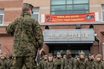 U.S. Marine Corps Maj. Todd Sturgill, the company commander for Headquarters Company, Headquarters Battalion, 1st Marine Division, speaks to Marines about building a combined command post in preparation for Freedom Shield 24 in Pohang, South Korea, Feb. 25, 2024. FS 24 is a defense-oriented exercise designed to strengthen the ROK-U.S. Alliance, enhance the combined defense posture, and further strengthen security and stability on the Korean peninsula. Sturgill is a native of Virginia. (U.S. Marine Corps photo by Staff Sgt. Amanda R. Taylor)