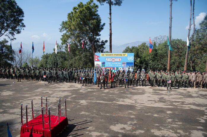 Combined service members from 18 countries participate in the closing ceremony of Exercise Shanti Prayas IV at the Birendra Peace Operations Centre parade field on March 4, 2024. Shanti Prayas IV is a multinational peacekeeping exercise sponsored by the Nepali Army and U.S. Indo-Pacific Command and is the latest in a series of exercises designed to support peacekeeping operations. (U.S. Marine Corps photo by Lance Cpl John Hall)