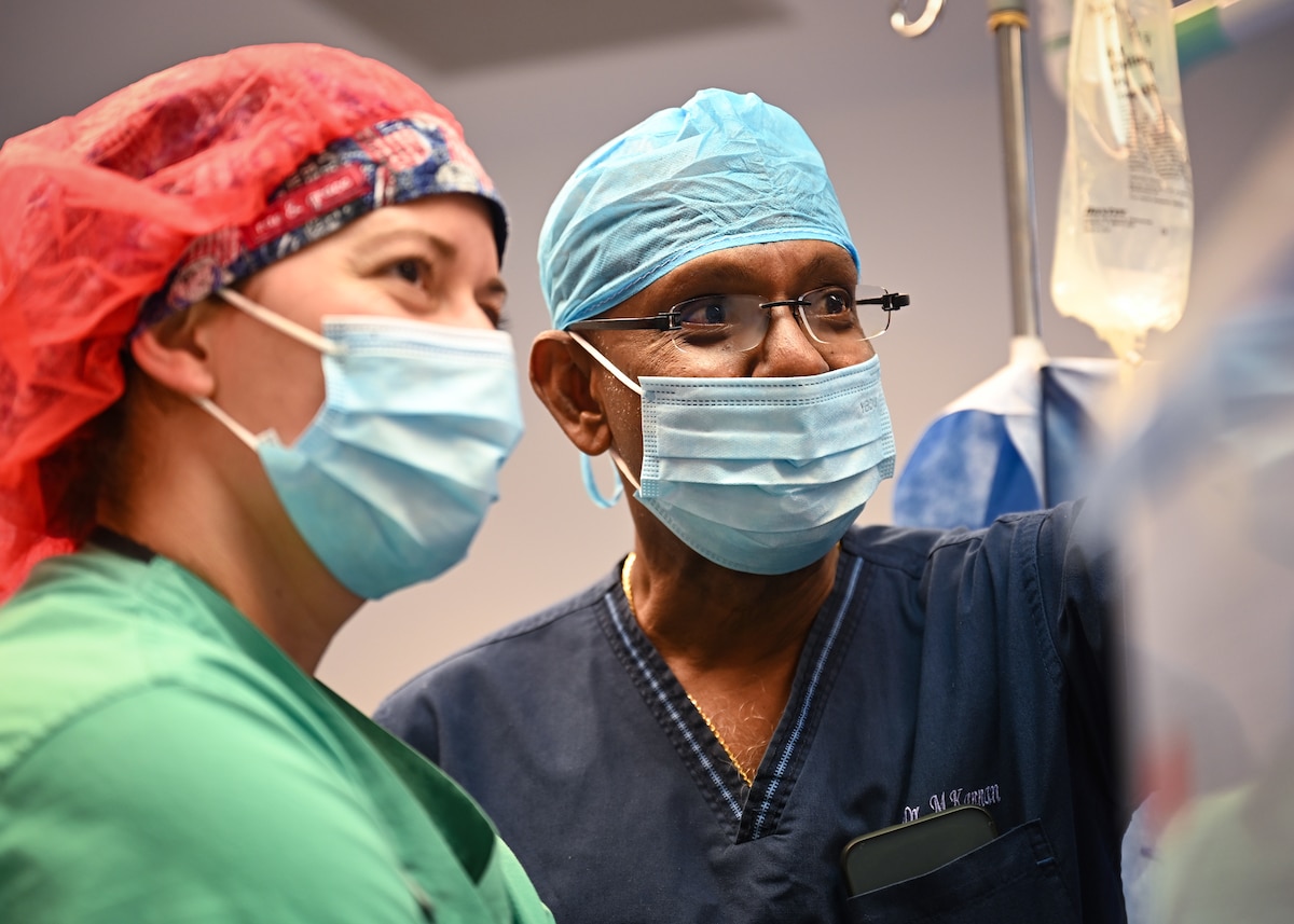 U.S. Air Force reservist Capt. Whitney Dorame (left), 349th Medical Squadron nurse anesthetist, and a partner nation anesthesiologist, work together to exchange best practices during surgery at Owen King European Union Hospital, Castries, St. Lucia, Feb. 26, 2024. The U.S. medical personnel deployed to train and exchange knowledge with St. Lucia’s surgeons and support staff, helping to ensure safety and stability of patients in the region. U.S. Air Force photo by Staff Sgt. Madeline Herzog