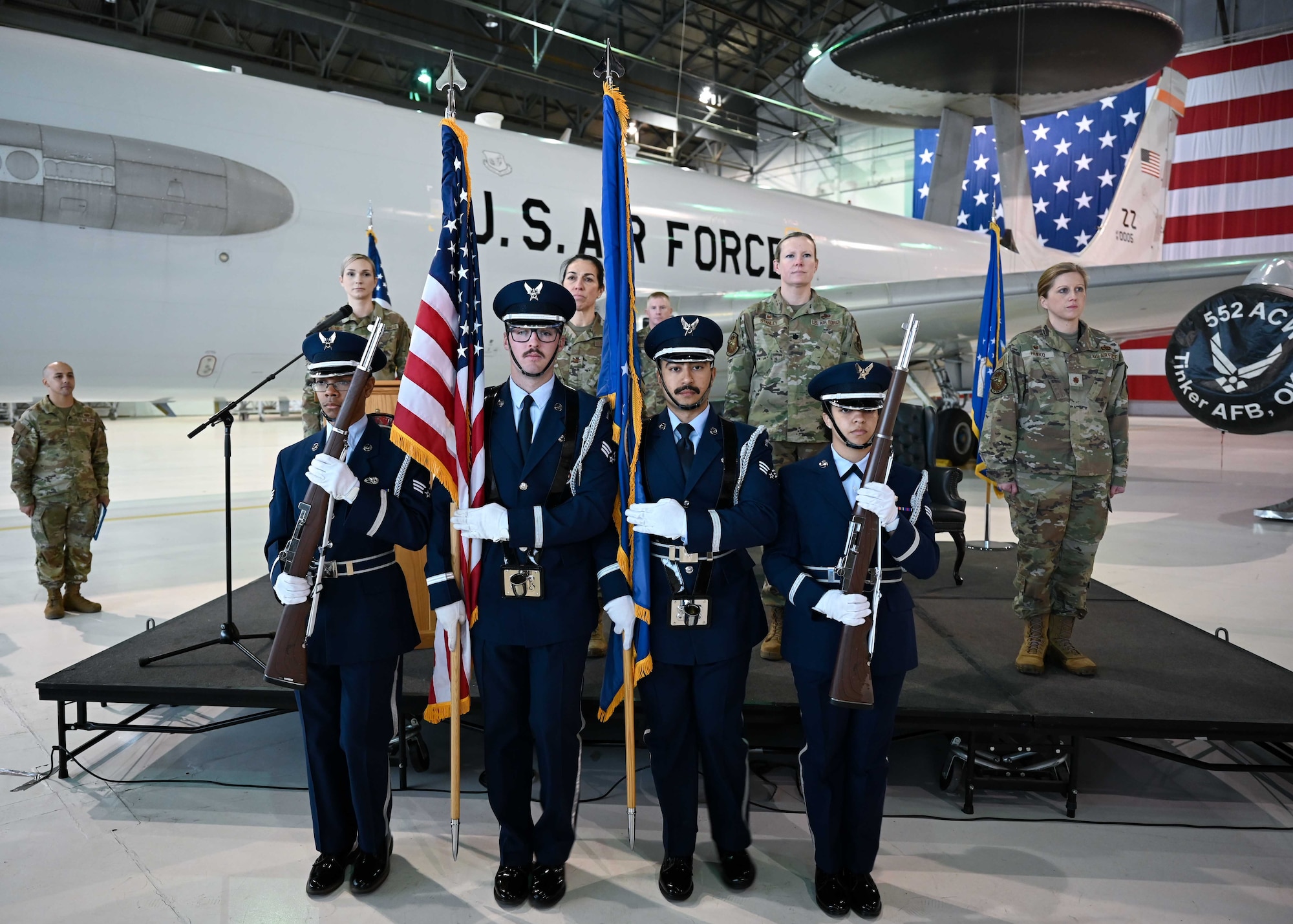 Honor guard and Airmen at change of command