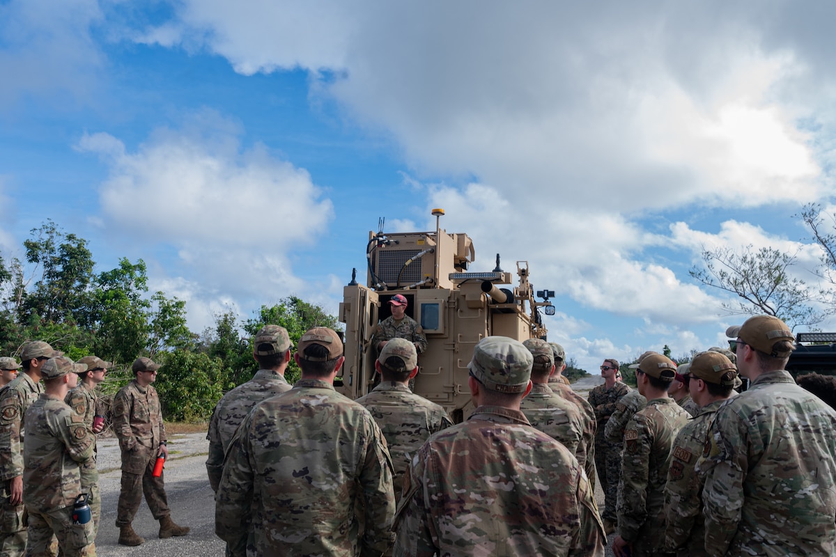 U.S. Air Force Tech. Sgt. Joseph Schmidt, 554th Rapid Engineering Deployable Heavy Operations Repair Squadron Engineer explosive ordnance disposal (EOD) contingency instructor, gives a safety brief before a Recovery of Air Bases Denied by Ordnance demonstration at Pacific Regional Training Center - Andersen, Guam, Jan. 30, 2024. The demonstration is the first at Andersen and it showcased an EOD capability that has been in progress for approximately 20 years. (U.S. Air Force photo by Senior Airman Jasmine M. Barnes)