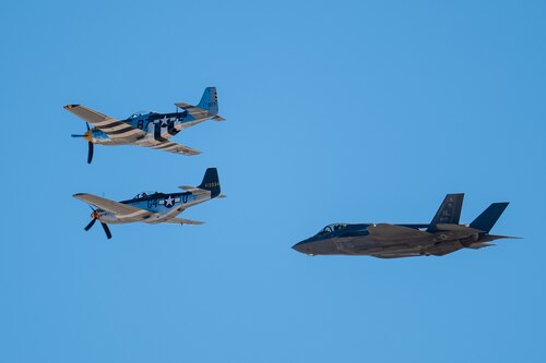 An F-35A Lightning II flies alongside two P-51 Mustang aircraft during the Heritage Flight Training Course at Davis-Monthan Air Force Base, Ariz., March 2, 2024. Heritage flights were flown with past and current U.S. Air Force aircraft to honor the past, present and future of American airpower. (U.S. Air Force photo by Airman 1st Class Jasmyne Bridgers-Matos)