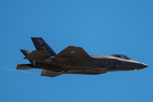 An F-35A Lightning II aircraft flies over Davis-Monthan Air Force Base, Ariz., March 2, 2024. The F-35A Lightning II Demonstration Team was part of the first operational F-35A wing for the Air Force, the 388th Fighter Wing, and flew capability demonstrations at air shows around the world. (U.S. Air Force photo by Airman 1st Class Jasmyne Bridgers-Matos)