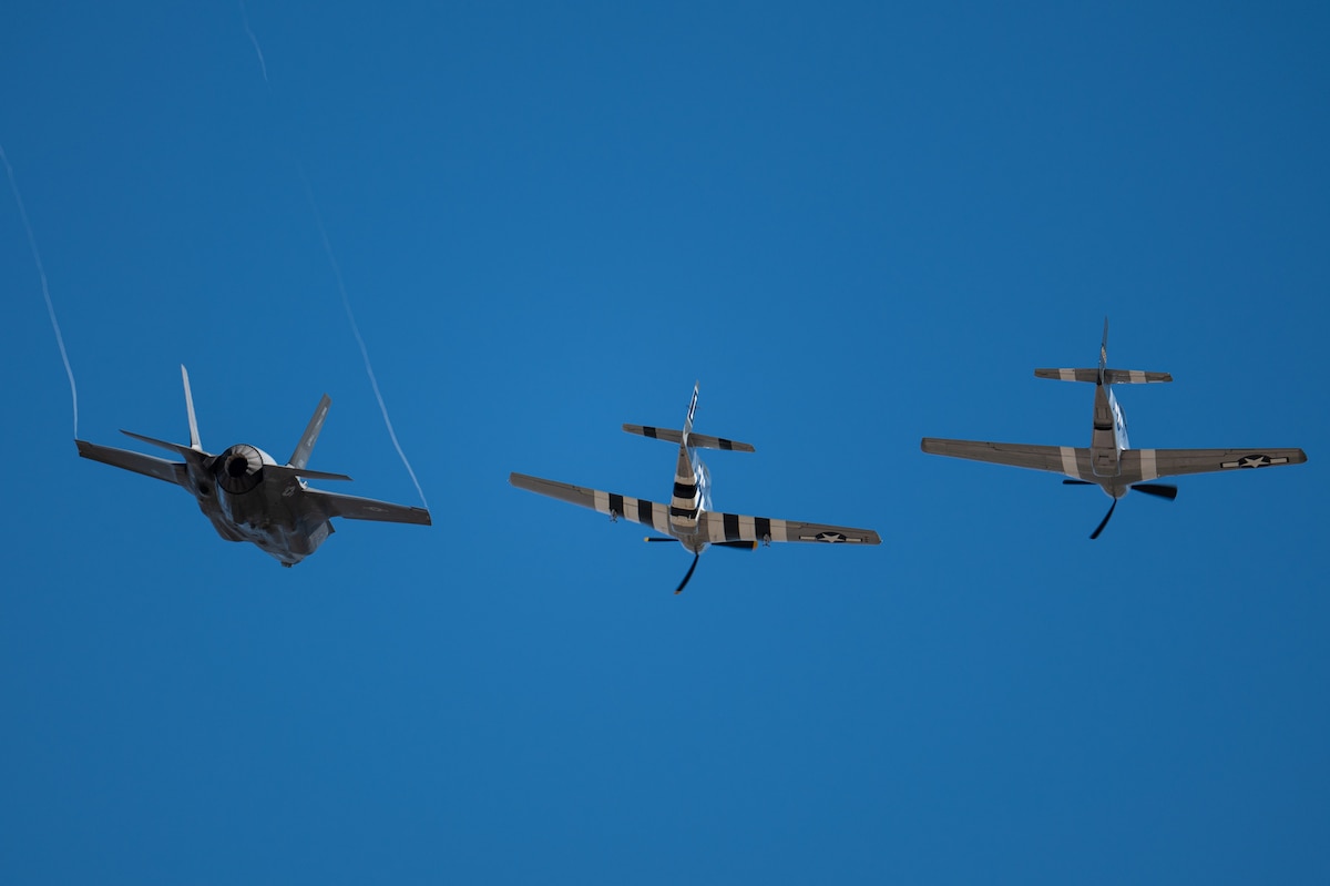 An F-35A Lightning II aircraft flies alongside two P-51 Mustang aircraft during the Heritage Flight Training Course at Davis-Monthan Air Force Base, Ariz., March 1, 2024. Heritage flights were flown with past and current U.S. Air Force aircraft to honor the past, present and future of American airpower. (U.S. Air Force photo by Airman 1st Class Jasmyne Bridgers-Matos)