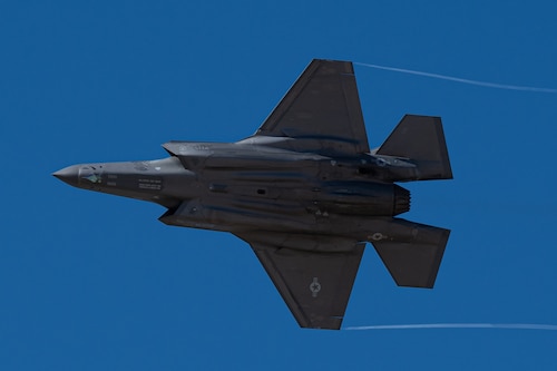 An F-35A Lightning II aircraft flies over Davis-Monthan Air Force Base, Ariz., March 1, 2024. The F-35A Lightning II Demonstration Team was part of the first operational F-35A wing for the Air Force, the 388th Fighter Wing, and flew capability demonstrations at air shows around the world. (U.S. Air Force photo by Airman 1st Class Jasmyne Bridgers-Matos)